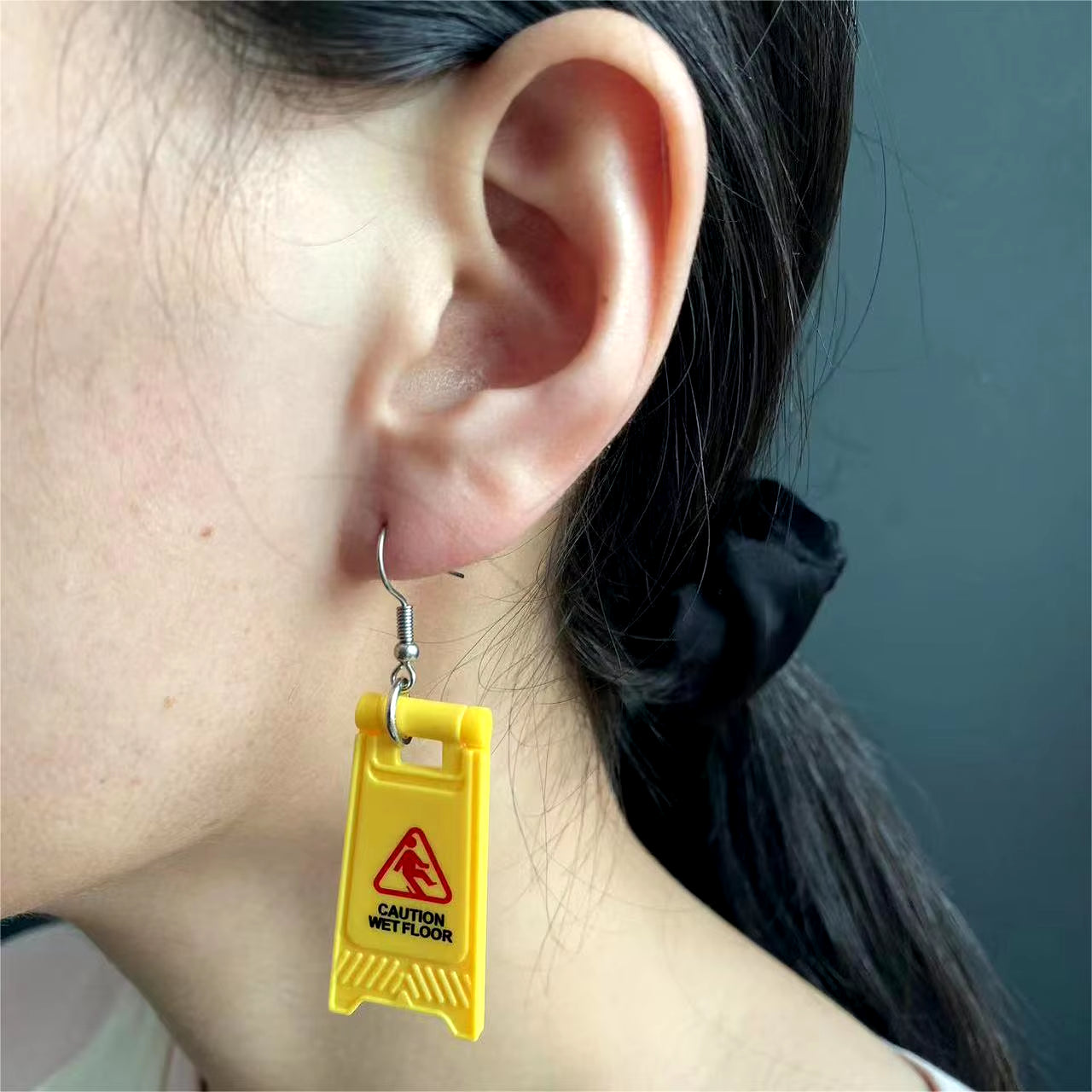 1 Pair of Warning Words Foldable Earrings Special Novelty Funny CAUTION WET FLOOR