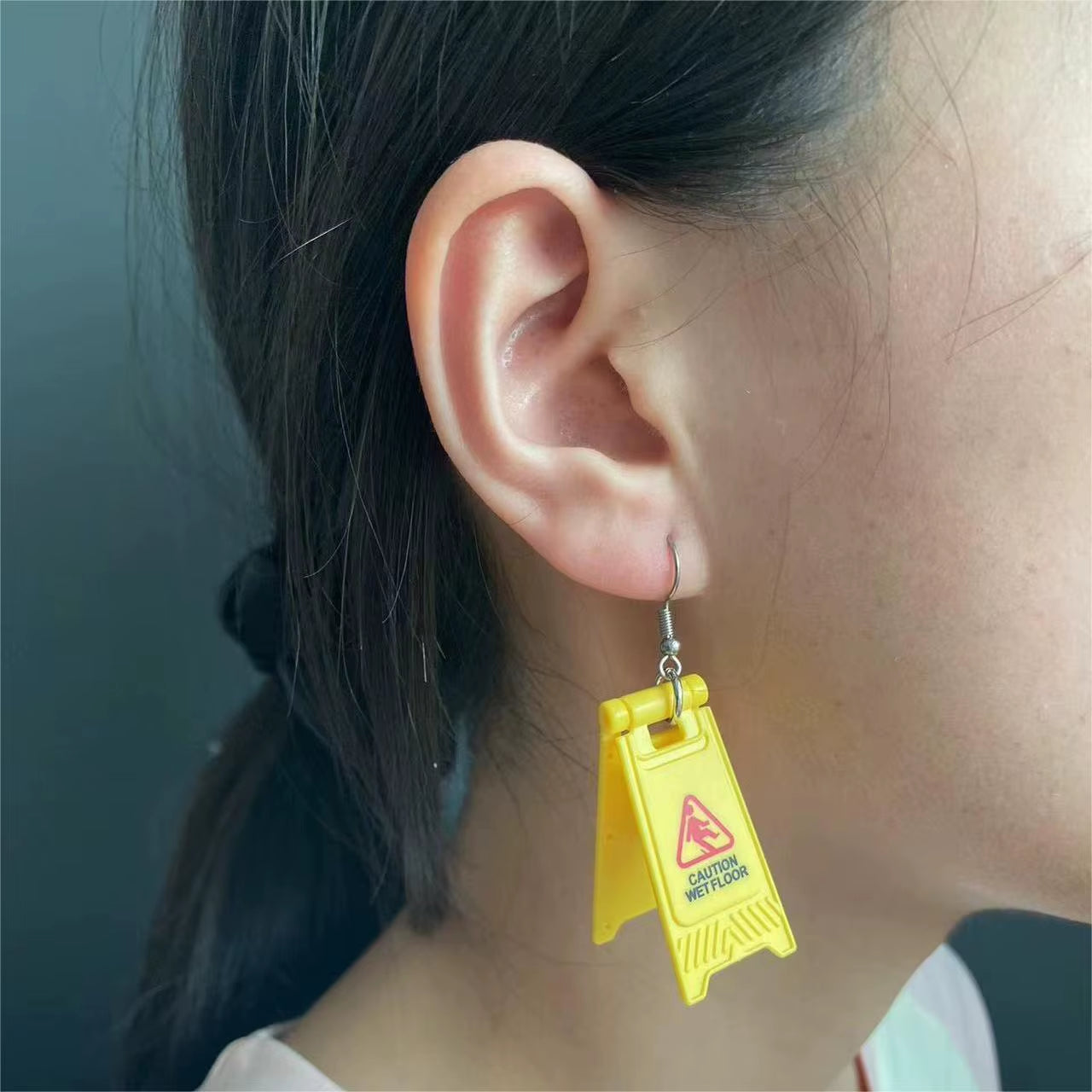 1 Pair of Warning Words Foldable Earrings Special Novelty Funny CAUTION WET FLOOR